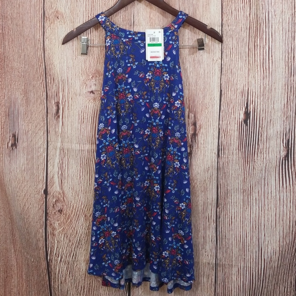 Colorful open shoulder tunic.